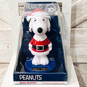Peanuts Snoopy Santa Holiday Solar Bobbler